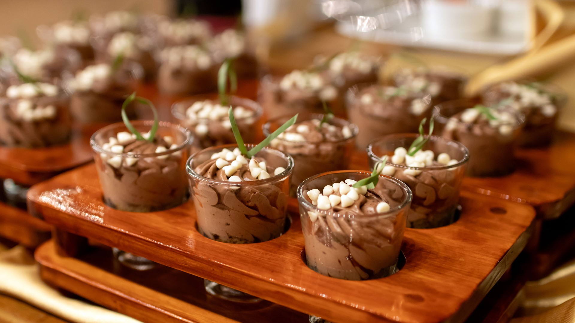 Indulge in delicious chocolate mousse served in elegant cups
