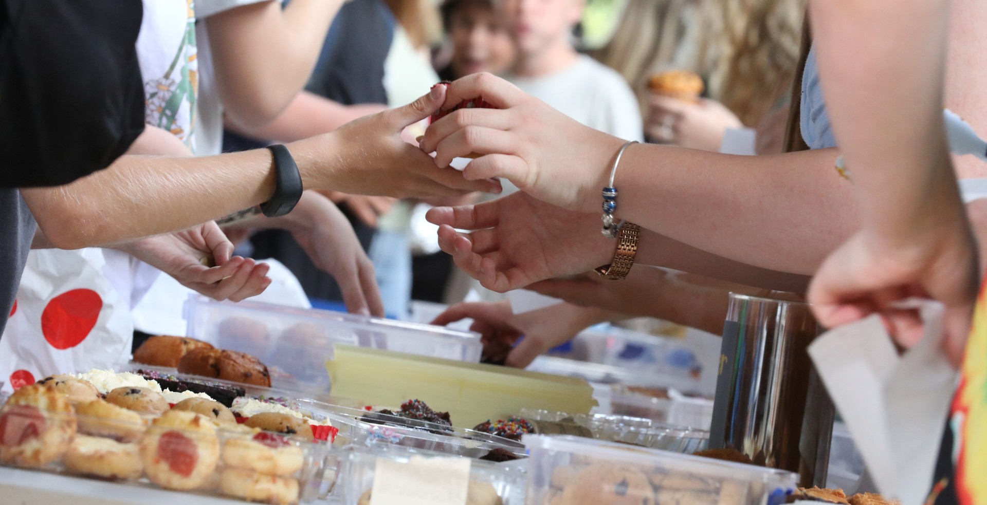 Cake and bake sale at a local community market or fundraiser event